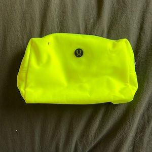 Bright yellow Lulu makeup bag